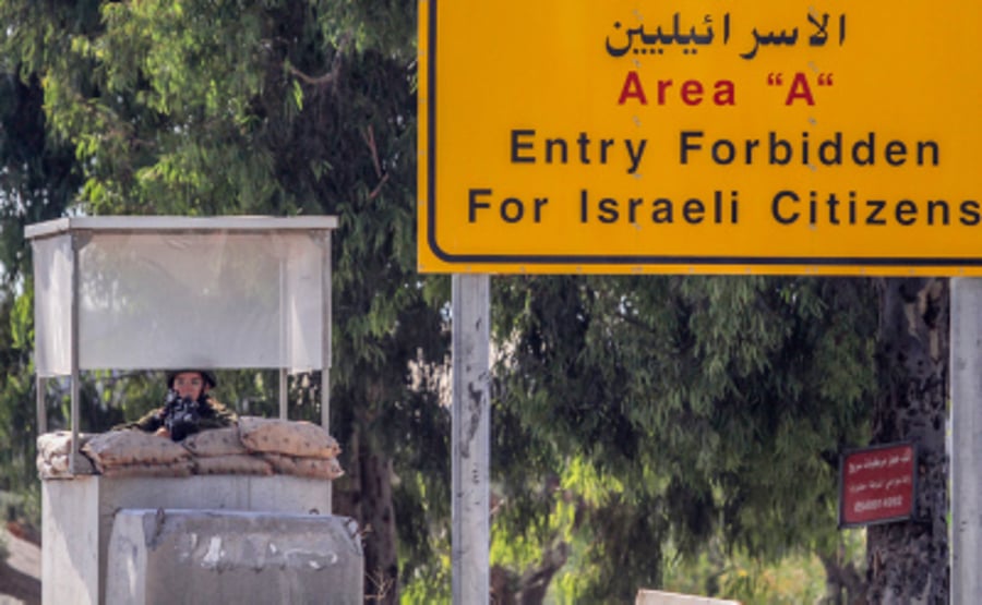 IIsraeli soldiers guard at the entrance to the West Bank city of Qalqilya, following a suspect shooting attack, June 22, 2024. 