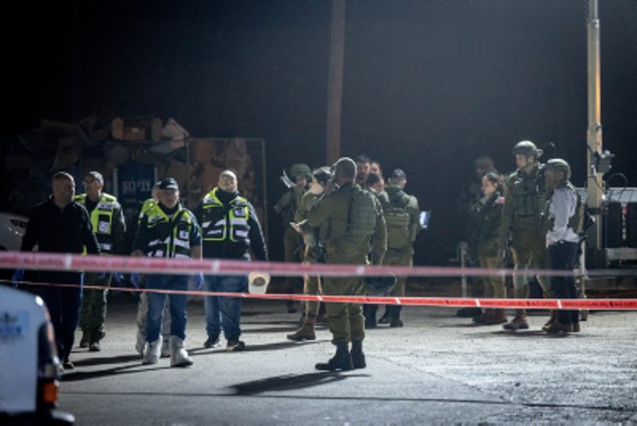 Israeli security forces at the scene of a deadly shooting attack, West Bank