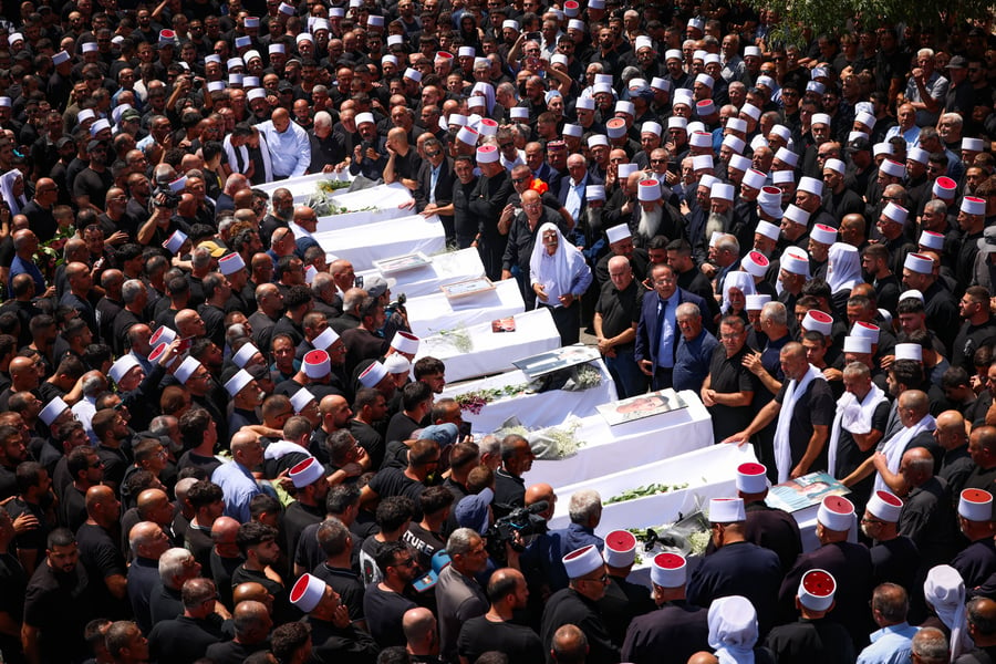 Funeral for Druze children killed at Majdal Shams by Hezbollah rocket.