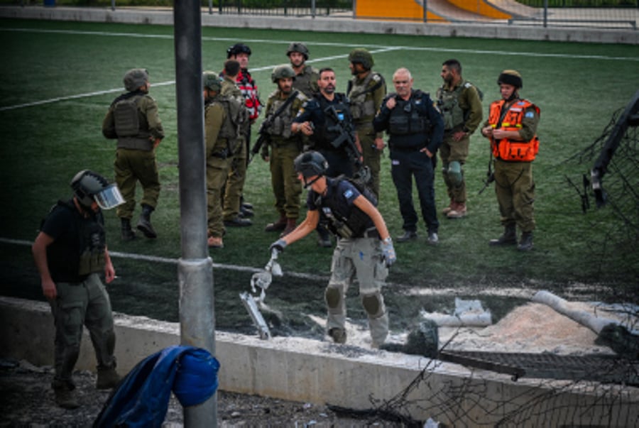 Israeli rescue forces at the site of a Hezbollah missile attack in the druze village of Majdal Shams, July 27, 2024