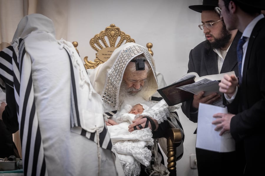 Rabbis performing the Jewish tradition ceremony of the Brit Mila