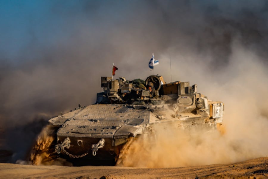 Israeli military vehicles seen near the Israeli-Gaza border, southern Israel, July 17, 2024. 