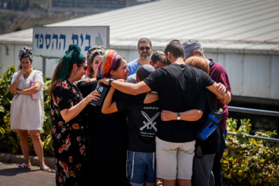 Family and friends attend the funeral of Yonatan Deutsch, at Har HaMenuchot Cemetery in Jerusalem, August 12, 2024. 