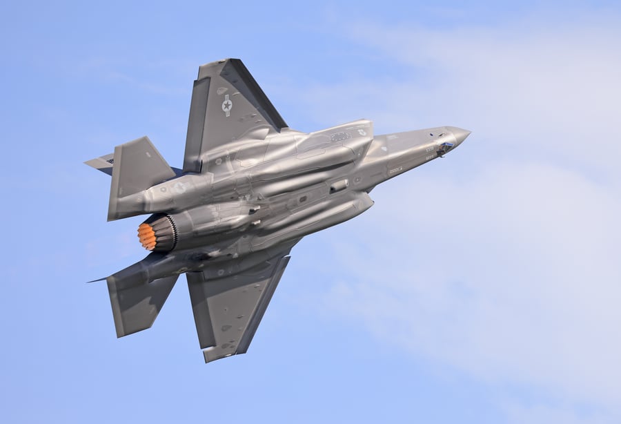 F35 A Demo Team flying on the blue sky background