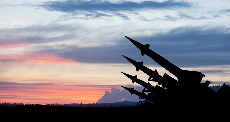 Missiles aimed at the sky at sunset