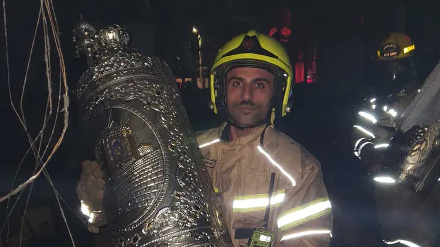 Fireman with Torah scroll