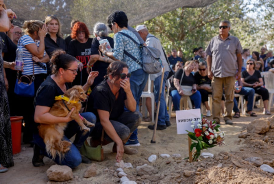 Family and friends attend the funeral service of Yagev Buchshtab at the Cemetery in Kibbutz Nirim, on August 21, 2024