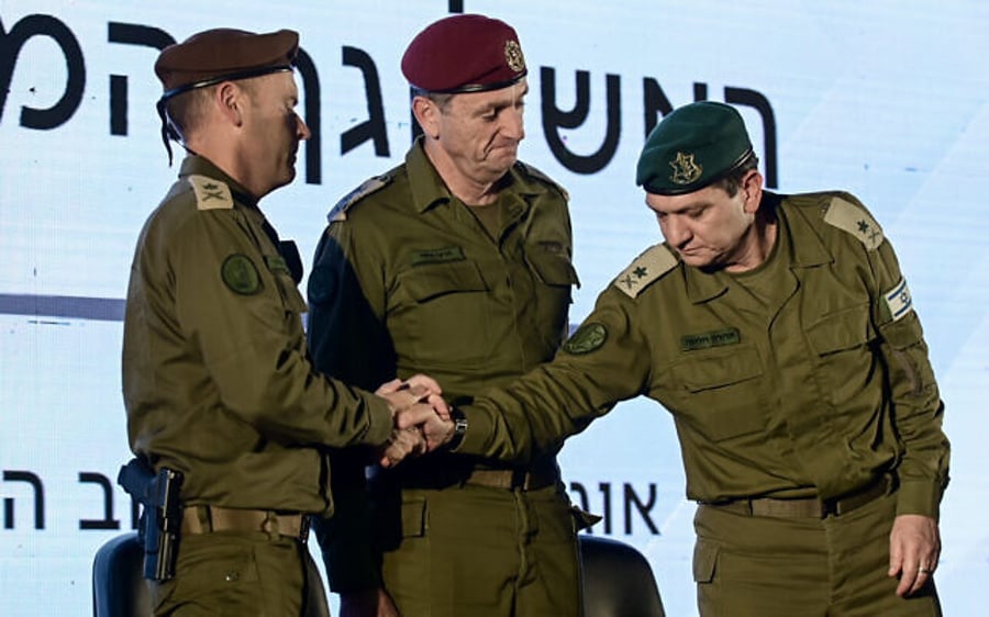 Outgoing head of the IDF Military Intelligence Directorate, Maj. Gen. Aharon Haliva (right) incoming commander of the directorate, Maj. Gen. Shlomi Binder (left) and Chief of Staff Lt. Gen. Herzi Halevi (center) attend a handover ceremony at the Glilot Base near Herzliya, August 21, 2024