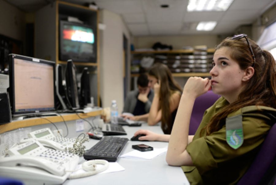 Radio broadcasters seen in the offices of Galei Tzahal, the national IDF radio station