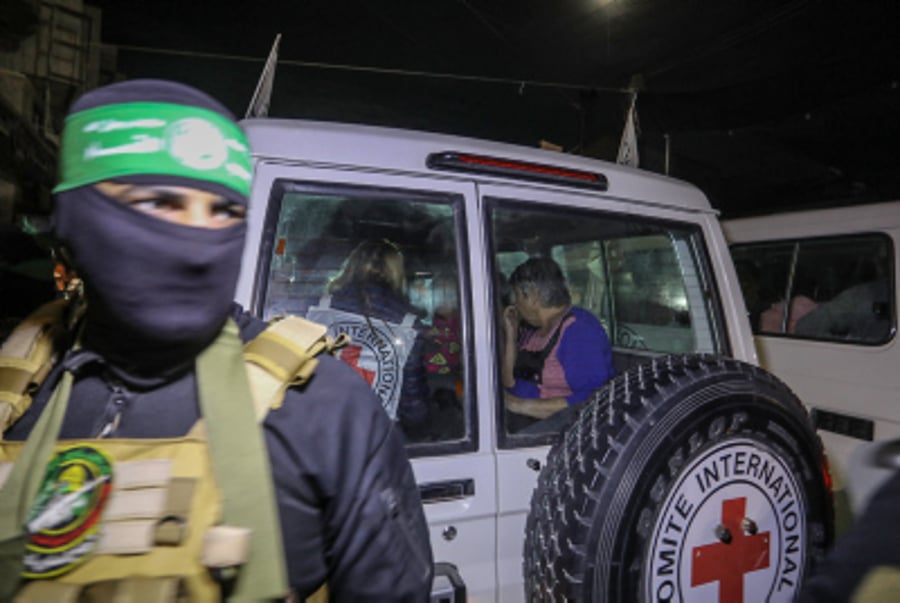 Members of Hamas and Islamic Jihad release Israeli hostages to the Red Cross