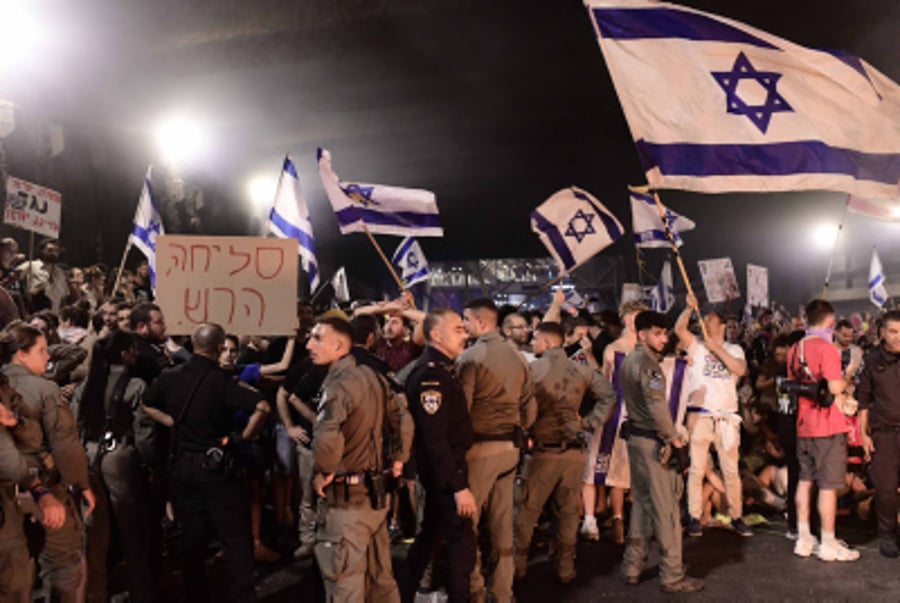 Israelis block the Ayalon Highway and clash with police in Tel Aviv, during a protest calling for the release of Israelis held hostage by Hamas terrorists in Gaza on September 1, 2024