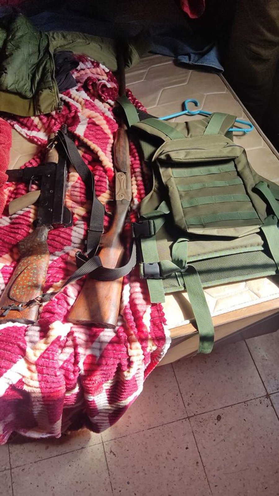 Weapons seized in anti-terror sweep.