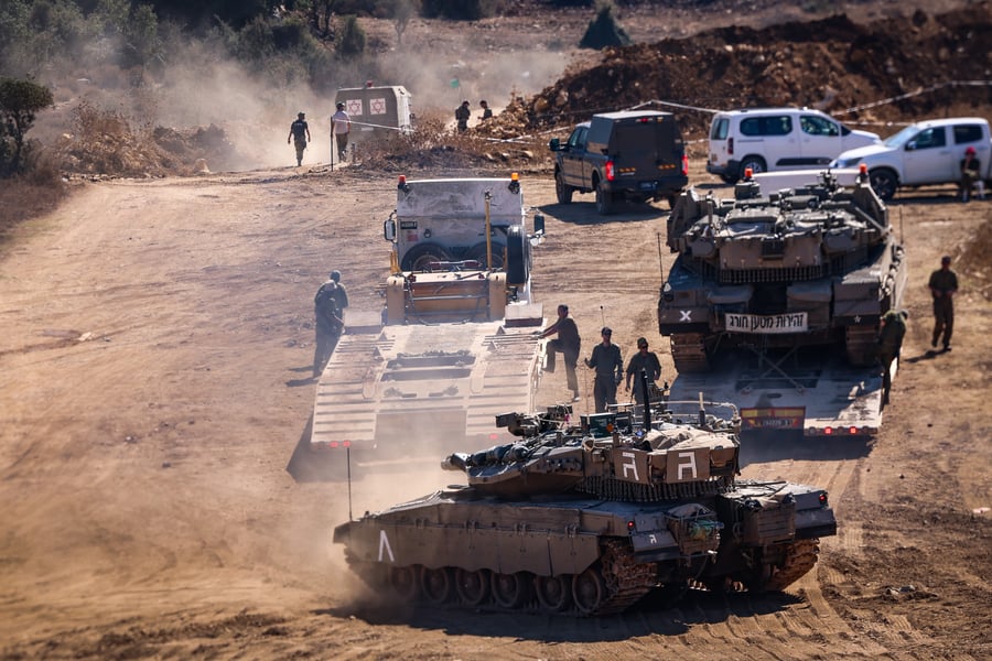 sraeli soldiers seen at a staging area near the Israeli border with Lebanon, September 29, 2024.