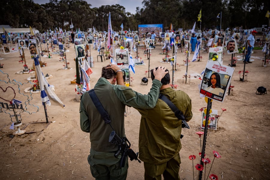 Israelis visit the site of the Re'im music festival massacre, in southern Israel, October 6, 2024.