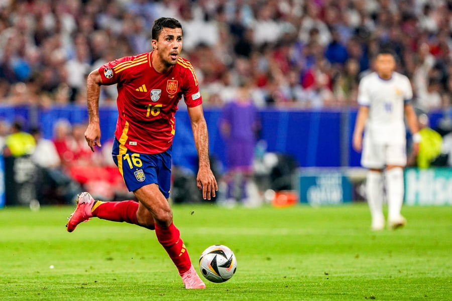 Rodri runs with the ball during the UEFA EURO 2024 Semi Final match between Spain and Franc