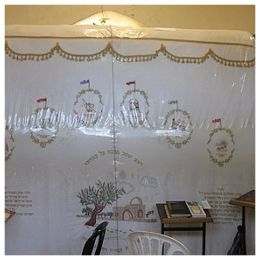 Rachel's tomb from the men's side. The cover was sewn from the wedding veil of Nava Appelbaum, who was killed on the eve of her wedding (9/9/2003) by a Palestinian suicide bomber.