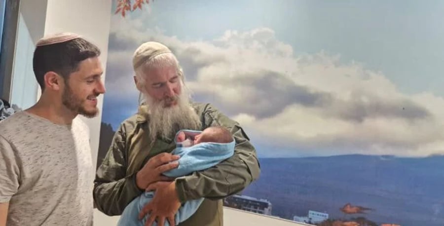 Rabbi Nir Yaakov Mas with David Shemer his newest grandchild