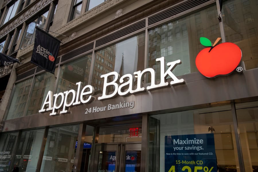 he exterior of an Apple Bank branch with the distinctive logo featuring a red apple.