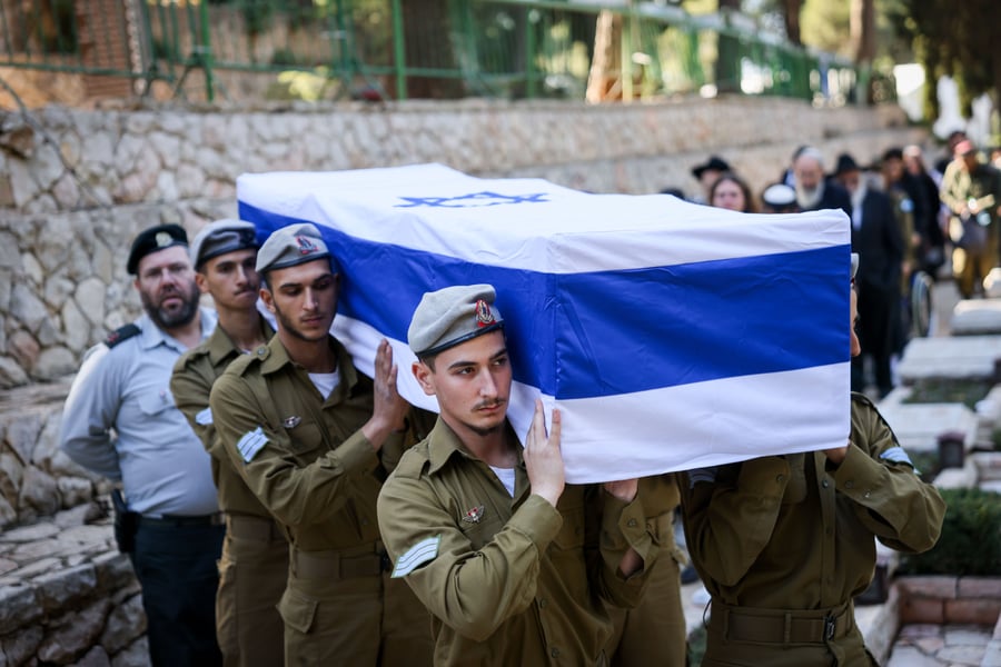 Family and friends of IDF soldier Staff sergeant Zamir Burke attend his funeral at Mount Herzl Military Cemetery in Jerusalem on December 1, 2024. 