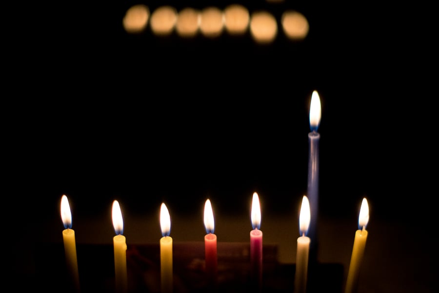 An Illustration of a lit Menorah (Chanukiah) during the Jewish holiday of Hanukkah, in Jerusalem