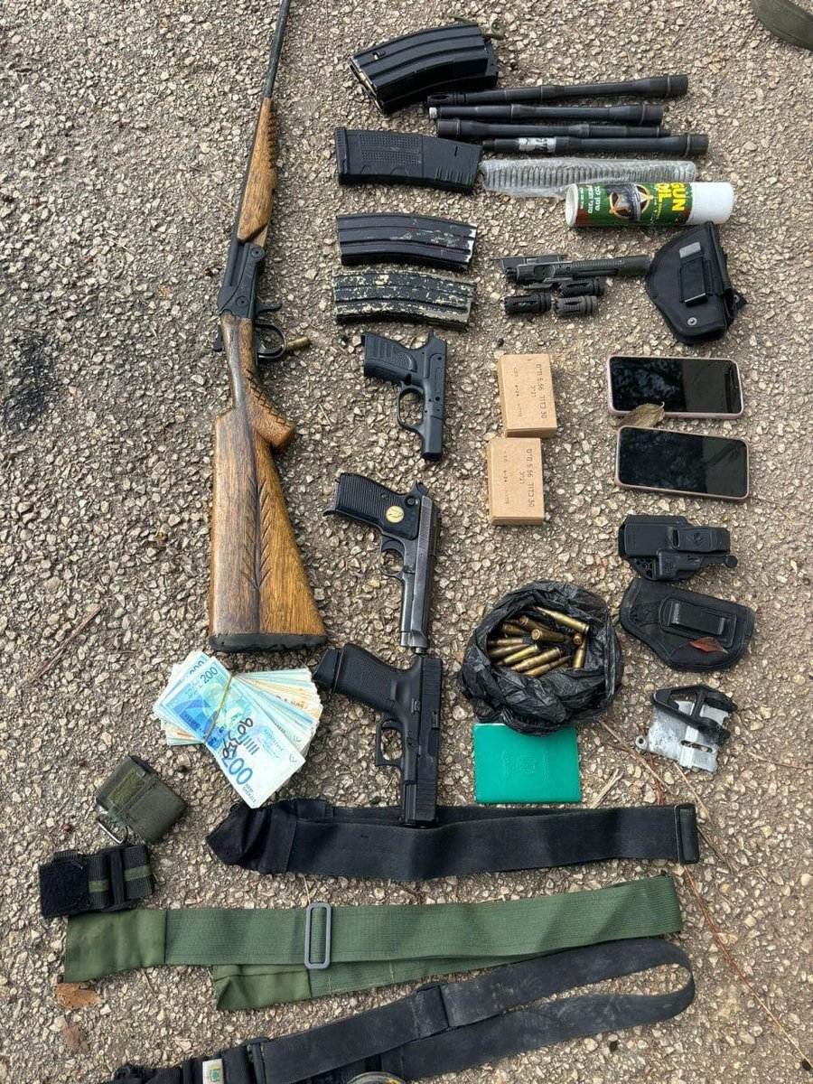 Weapons and cash found on the eliminated terrorist