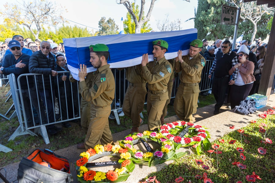 Family and friends of Israeli soldier Sergeant Eliav Astuker attend his funeral in Ashdod, on January 12, 2025. He was killed during a ground operation in the Gaza Strip. 