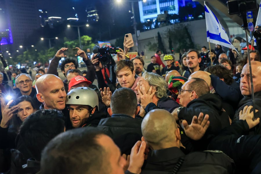 Demonstrators protest against the Israeli government and for the release of Israelis held hostage in the Gaza Stripc outside Hakirya Base in Tel Aviv, January 11, 2025. 