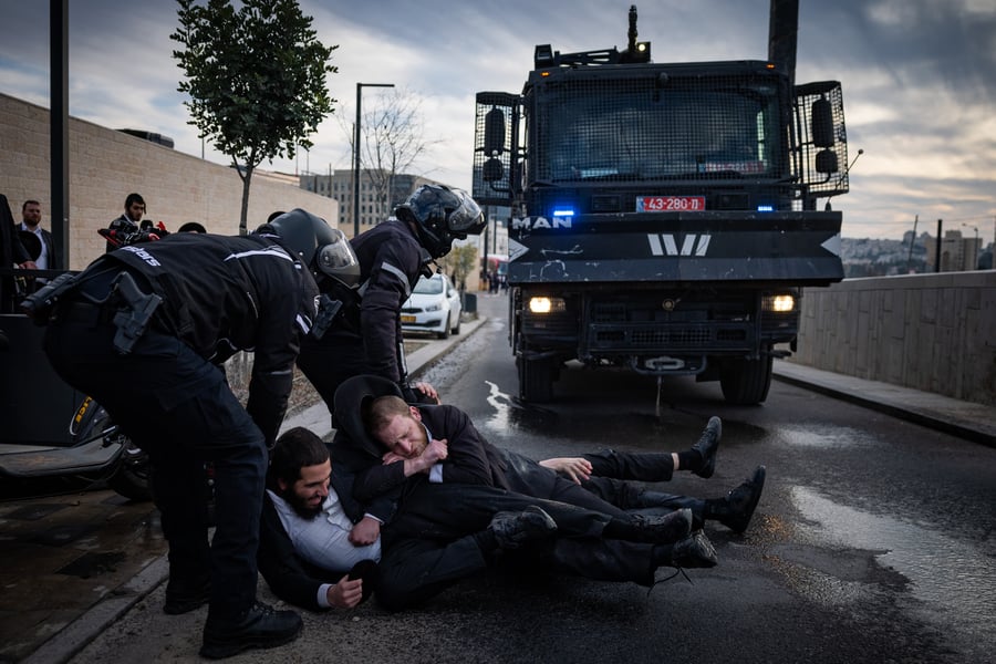 Ultra orthodox Jews protest and clash with police during a protest against the drafting of ultra orthodox jews to the Israeli army