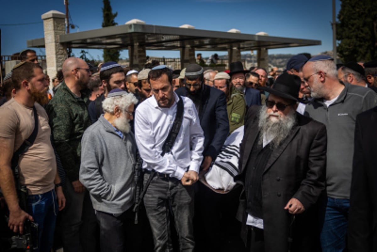 Friends and family attend the funeral of Rabbi Yitzhak Zeiger, killed in a terror attack near Eli, March 1, 2024