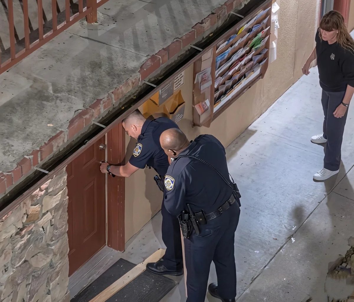Police open the door to the hotel room