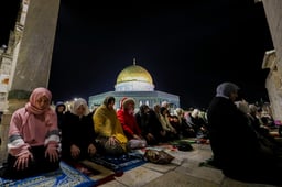 Palestinian worshippers perform Taraweeh prayers at the beginning of the holy fasting month of Ramadan, at the al-Aqsa mosque in Jerusalem's Old City, March 22, 2023. 