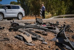 The remains of the vehicle hit by a missile fired from Lebanon that killed Noa and Nir Baranes near Nafah Junction, in the Golan Heights, July 10, 2024.