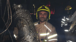 Fireman with Torah scroll