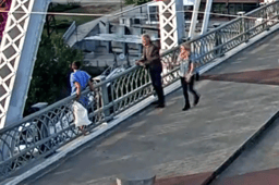 Jon Bon Jovi and a colleague talked the woman off the ledge.