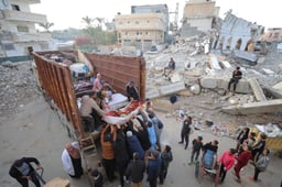 Palestinians moving around the ruins of Gaza City.