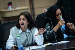 Ziv Abud, the girlfriend of Eliya Cohen whose held hostage in the Gaza Strip attends a special committee for public inquiries at the Knesset, the Israeli Parliament in Jerusalem, on December 3, 2024. 