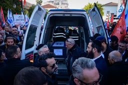 People pay their respects during the funeral service of late Israeli hostages Shiri Bibas and her children Ariel and Kfir in Rishon LeZion, February 26, 2025.