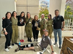 Alon and Ella at the hospital with IDF soldiers