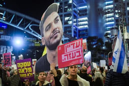 Demonstrators protest for the release of Israelis held hostage in the Gaza Strip, outside Hakirya Base in Tel Aviv, March 11, 2025.