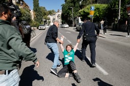 sraelis attending a protest march against the decision of Israeli prime minister Benjamin Netanyahu to fire head of Shin Bat Ronen Bar, clash with police in Jerusalem. March 19, 2025.