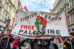 UK: Pro-Palestinian protesters hold a banner and chant at a demonstration calling for an end to Israeli attacks on Gaza