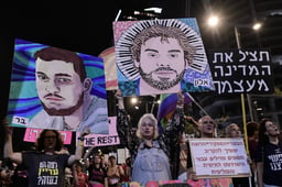 Demonstrators protest against the Israeli government and for the release of Israelis held hostage in the Gaza Strip outside Hakirya Base in Tel Aviv, May 10, 2025. 