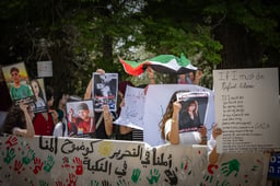 Demonstrators protest calling to end the war in Gaza while others demonstrate in favor of continuing the fighting, at the Hebrew University in Jerusalem on May 12, 2025. 