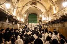 Orthodox Jews pray outside the al-Aqsa compound, also known to Jews as the Temple Mount, in the Muslim quarters of Jerusalem's Old City during the Passover holiday. April 15, 2025. 
