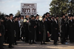 Over a thousand Ultra Orthodox Jews protested outside the military prison, south of Haifa, in solidarity with two Yeshiva students who were imprisoned for refusing to report to the IDF recruitment offices