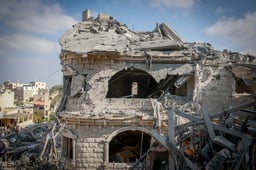 sraeli security and rescue forces at the scene where a ballistic missile fired from Iran hit and caused damage in Tamra, June 15, 2025. 