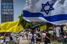 Families of Israelis held hostage in Gaza, rally outside the PM's office in Jerusalem, calling for the government to seal a deal which would see all hostages released, on July 1, 2025.
