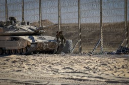 IDF soldiers seen near the border fence with the Gaza Strip, southern Israel, on July 4, 2025.