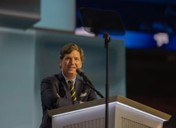 Tucker Carlson addresses the 2024 Republican National Convention at the Fiserv Forum.
