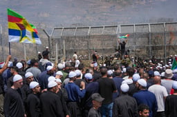 ruze residents protest near the Israeli-Syrian border fence in solidarity with their community in Syria, in Majdal Shams, July 16, 2025.